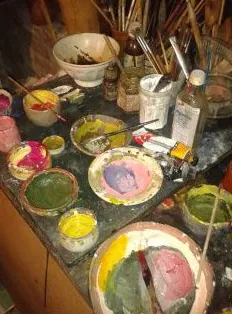 Bowls of paint in pink, green and yellow